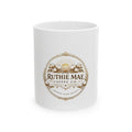 White mug with Ruthie Mae Coffee Co. logo on a white background
